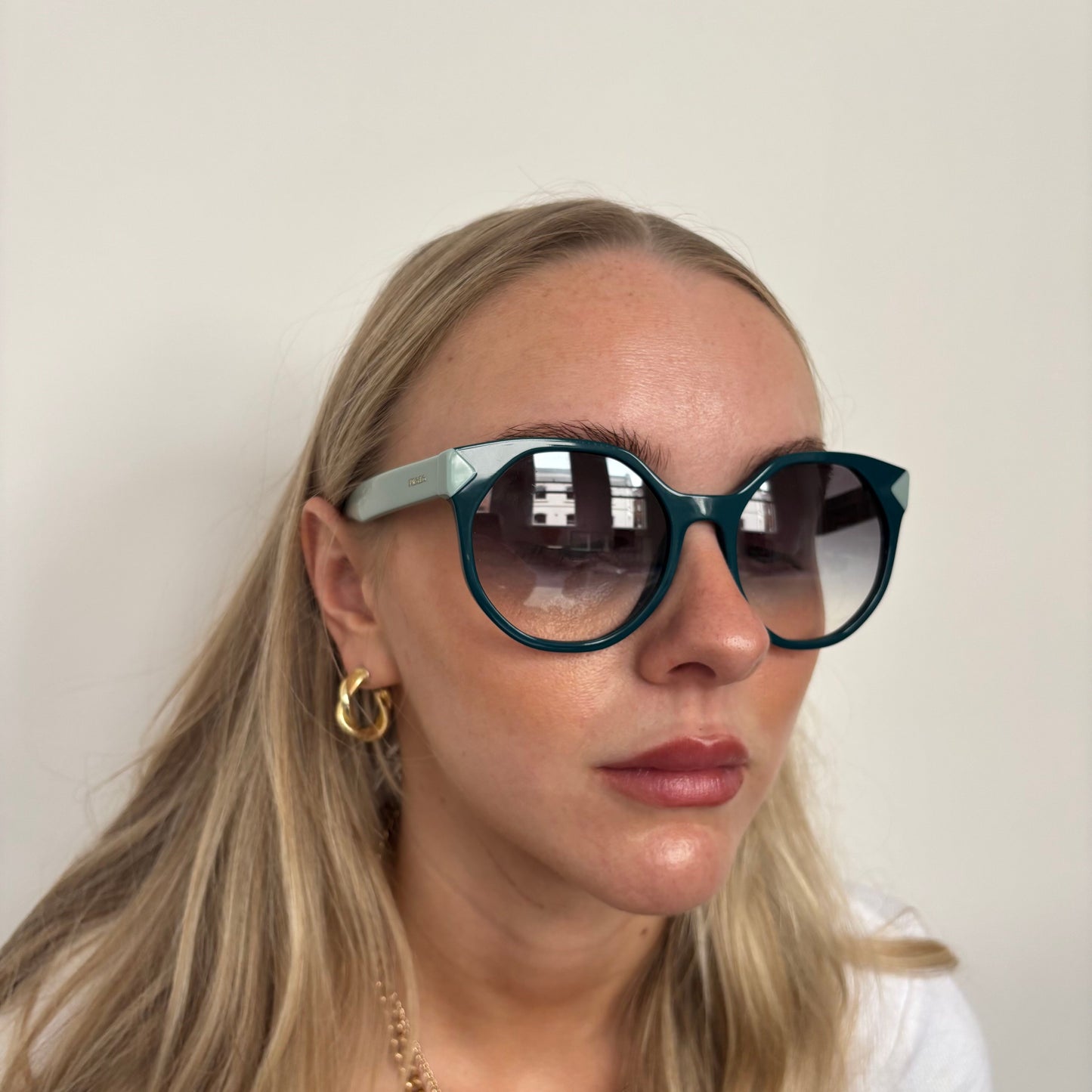 Prada Teal SPR11T Sunglasses