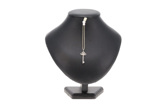 Tiffany & Co Fleur de Lis Key Pendant In Platinum With Brilliant Diamonds
