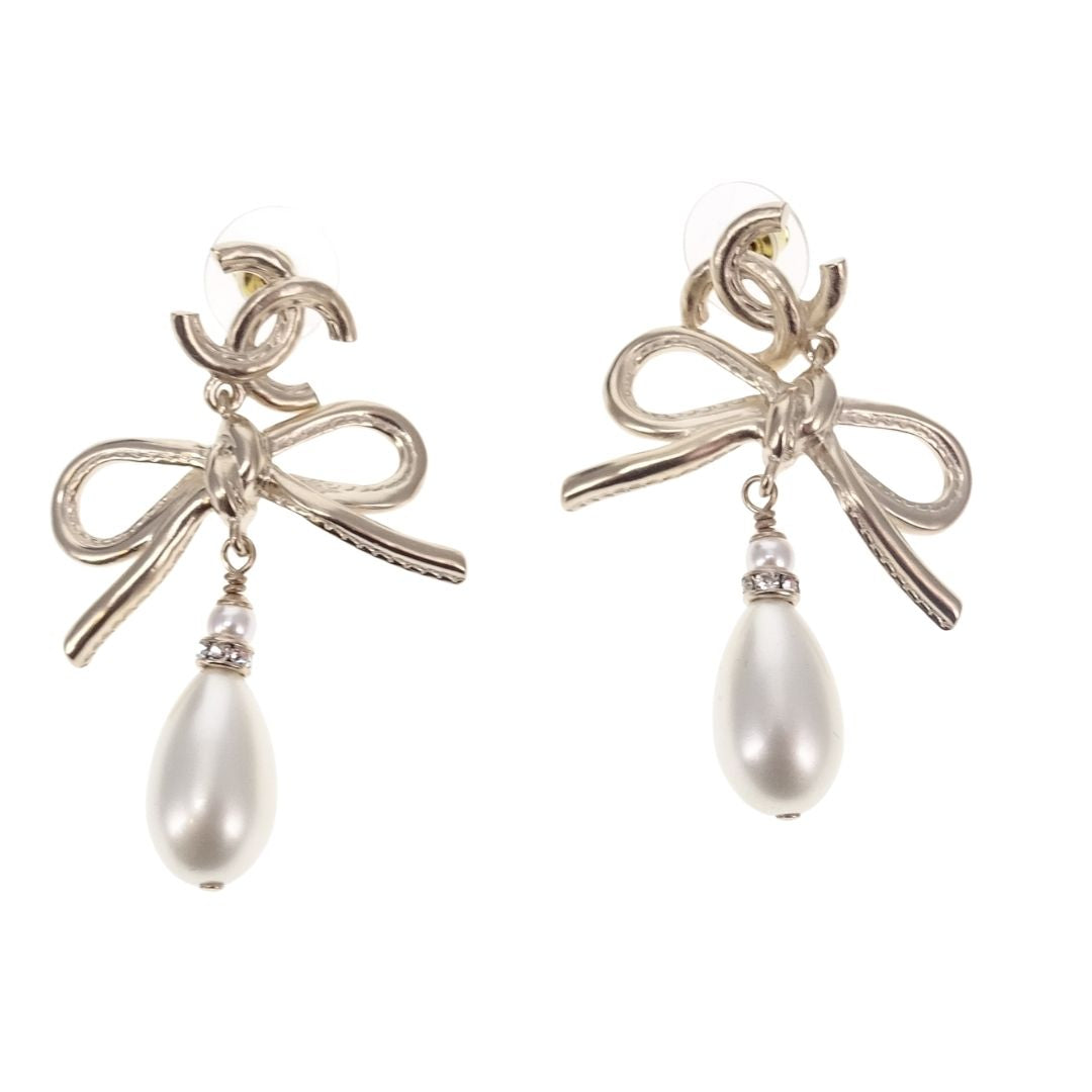 Chanel Dangle Earrings Pearl and Bow Goldtone 2022