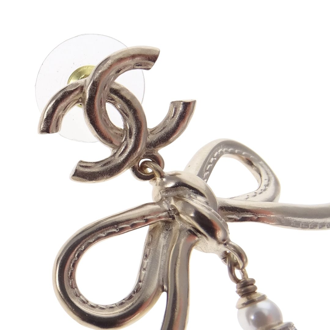 Chanel Dangle Earrings Pearl and Bow Goldtone 2022