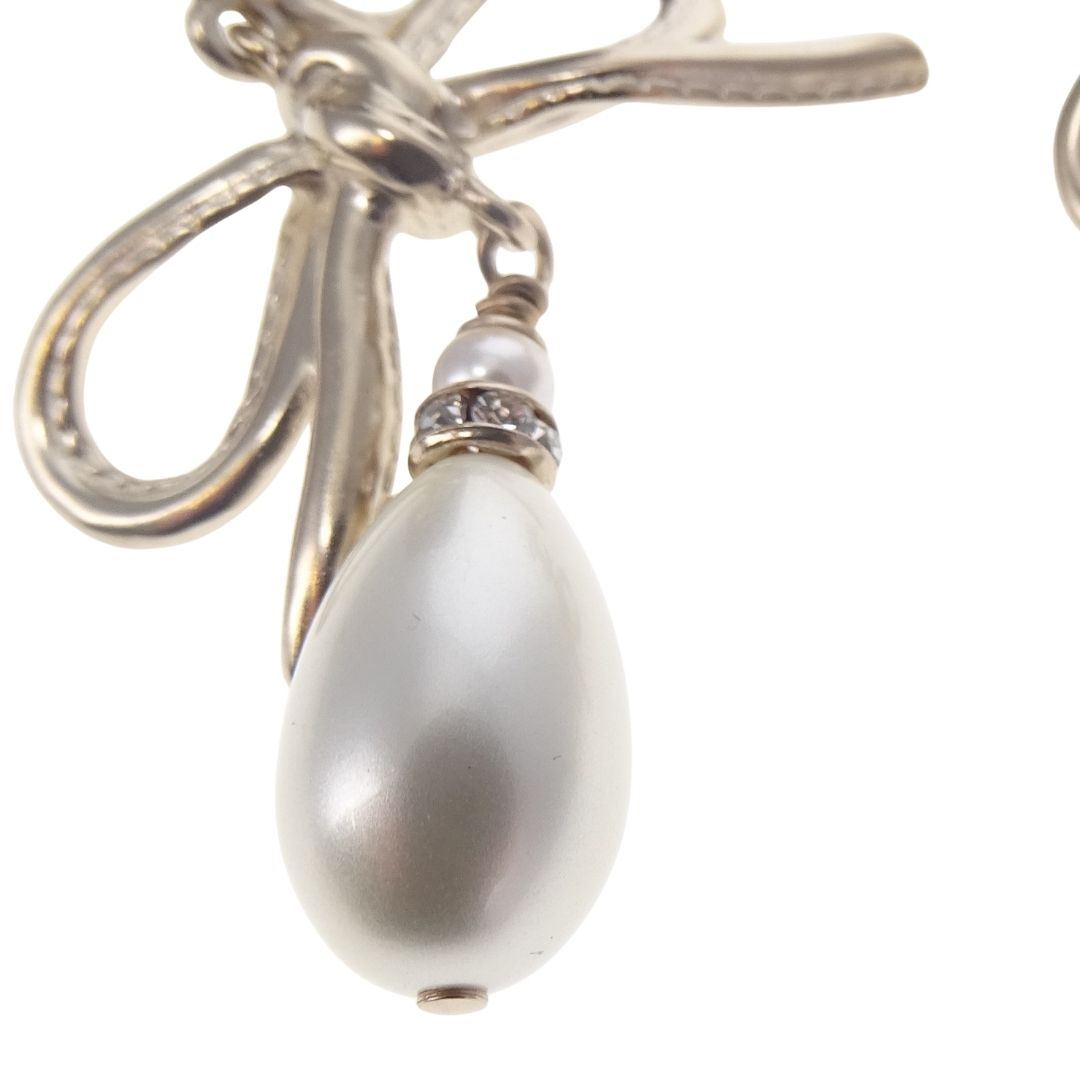 Chanel Dangle Earrings Pearl and Bow Goldtone 2022