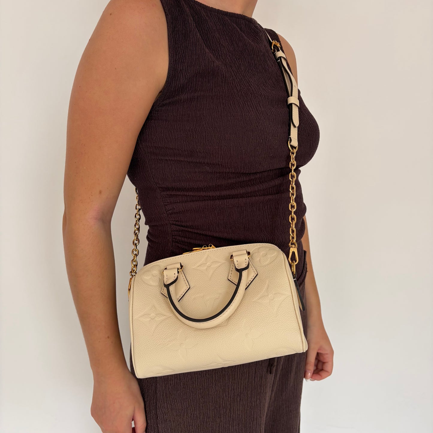Louis Vuitton Speedy Bandouliere 20 Empreinte Crème