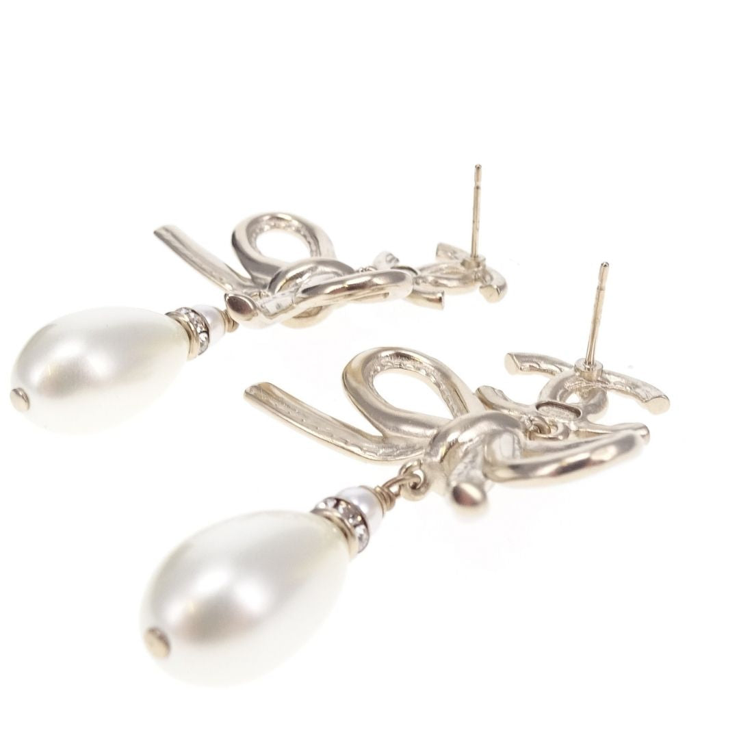 Chanel Dangle Earrings Pearl and Bow Goldtone 2022