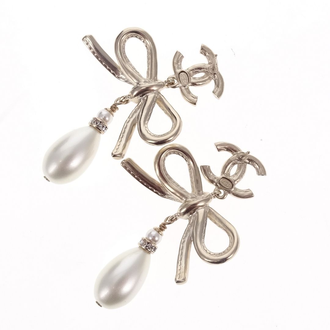 Chanel Dangle Earrings Pearl and Bow Goldtone 2022