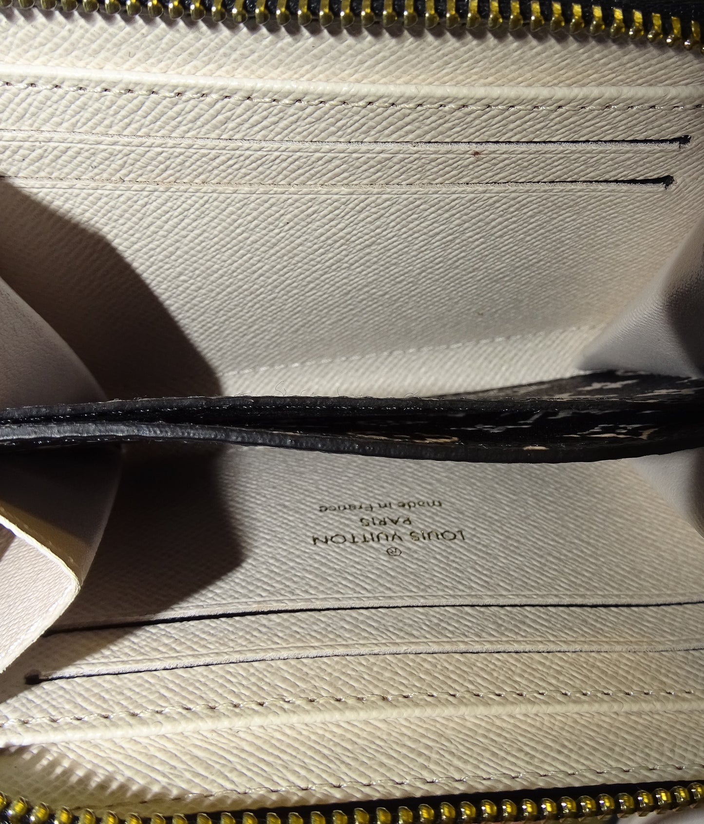 Louis Vuitton Crafty Zippy Wallet (NFID)